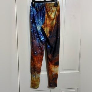 FOUR pairs of graphic leggings!
